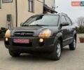 Сірий Хендай Туксон, об'ємом двигуна 2 л та пробігом 187 тис. км за 7700 $, фото 26 на Automoto.ua