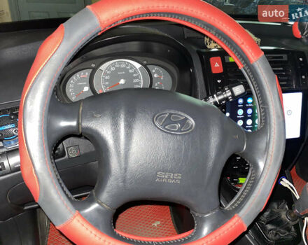 Сірий Хендай Туксон, об'ємом двигуна 2.02 л та пробігом 226 тис. км за 9200 $, фото 5 на Automoto.ua