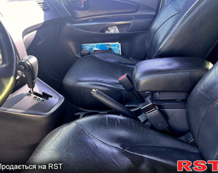 Серый Хендай Туксон, объемом двигателя 2 л и пробегом 285 тыс. км за 8700 $, фото 12 на Automoto.ua