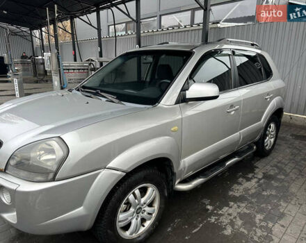 Серый Хендай Туксон, объемом двигателя 1.98 л и пробегом 227 тыс. км за 7700 $, фото 16 на Automoto.ua