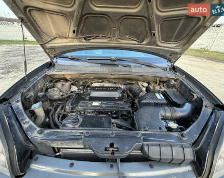 Сірий Хендай Туксон, об'ємом двигуна 1.98 л та пробігом 220 тис. км за 8200 $, фото 12 на Automoto.ua