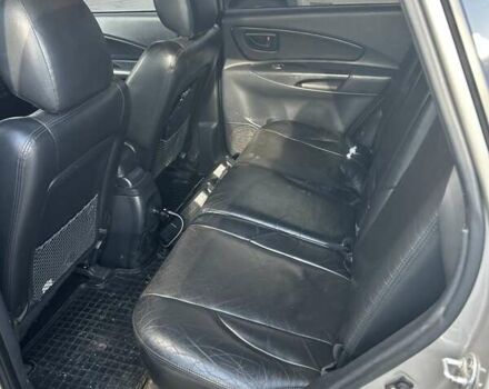 Сірий Хендай Туксон, об'ємом двигуна 1.98 л та пробігом 413 тис. км за 7300 $, фото 7 на Automoto.ua