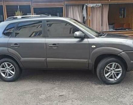Серый Хендай Туксон, объемом двигателя 1.98 л и пробегом 258 тыс. км за 7500 $, фото 32 на Automoto.ua