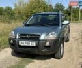 Сірий Хендай Туксон, об'ємом двигуна 1.98 л та пробігом 161 тис. км за 8900 $, фото 29 на Automoto.ua