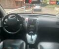 Сірий Хендай Туксон, об'ємом двигуна 1.98 л та пробігом 190 тис. км за 8800 $, фото 12 на Automoto.ua