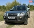 Сірий Хендай Туксон, об'ємом двигуна 1.98 л та пробігом 161 тис. км за 8900 $, фото 27 на Automoto.ua