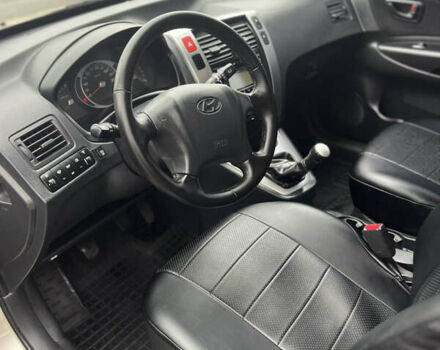 Серый Хендай Туксон, объемом двигателя 1.98 л и пробегом 151 тыс. км за 8100 $, фото 7 на Automoto.ua