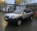 Сірий Хендай Туксон, об'ємом двигуна 2 л та пробігом 215 тис. км за 7750 $, фото 1 на Automoto.ua
