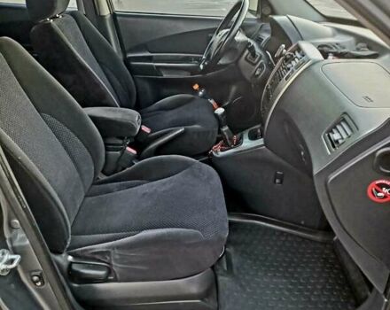 Серый Хендай Туксон, объемом двигателя 2 л и пробегом 207 тыс. км за 8000 $, фото 13 на Automoto.ua