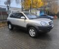 Сірий Хендай Туксон, об'ємом двигуна 2 л та пробігом 215 тис. км за 7750 $, фото 1 на Automoto.ua