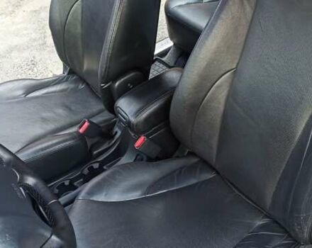 Серый Хендай Туксон, объемом двигателя 1.98 л и пробегом 258 тыс. км за 7500 $, фото 24 на Automoto.ua