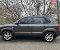 Серый Хендай Туксон, объемом двигателя 1.98 л и пробегом 220 тыс. км за 8500 $, фото 3 на Automoto.ua