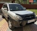 Серый Хендай Туксон, объемом двигателя 1.98 л и пробегом 256 тыс. км за 7750 $, фото 1 на Automoto.ua