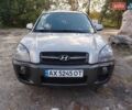 Серый Хендай Туксон, объемом двигателя 1.98 л и пробегом 171 тыс. км за 8400 $, фото 1 на Automoto.ua