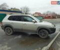 Сірий Хендай Туксон, об'ємом двигуна 1.98 л та пробігом 222 тис. км за 8000 $, фото 3 на Automoto.ua