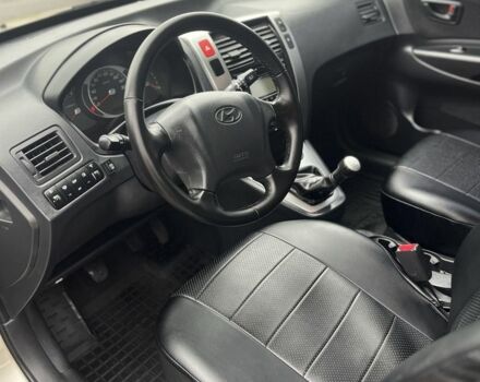 Серый Хендай Туксон, объемом двигателя 2 л и пробегом 151 тыс. км за 8300 $, фото 5 на Automoto.ua