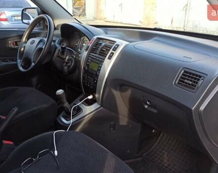 Серый Хендай Туксон, объемом двигателя 2 л и пробегом 127 тыс. км за 9300 $, фото 31 на Automoto.ua