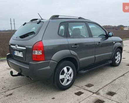 Серый Хендай Туксон, объемом двигателя 1.98 л и пробегом 177 тыс. км за 8200 $, фото 6 на Automoto.ua