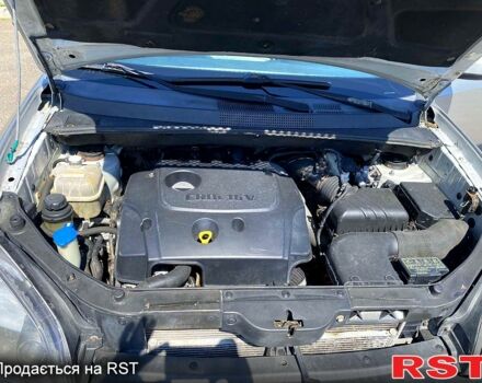 Сірий Хендай Туксон, об'ємом двигуна 2 л та пробігом 225 тис. км за 7800 $, фото 8 на Automoto.ua