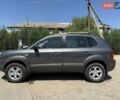Серый Хендай Туксон, объемом двигателя 1.98 л и пробегом 147 тыс. км за 8900 $, фото 4 на Automoto.ua