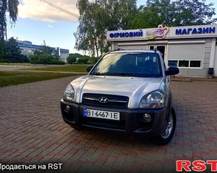 Серый Хендай Туксон, объемом двигателя 2.7 л и пробегом 280 тыс. км за 6500 $, фото 7 на Automoto.ua