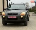 Сірий Хендай Туксон, об'ємом двигуна 2 л та пробігом 187 тис. км за 7700 $, фото 9 на Automoto.ua