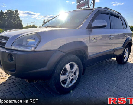 Серый Хендай Туксон, объемом двигателя 2 л и пробегом 285 тыс. км за 8700 $, фото 1 на Automoto.ua