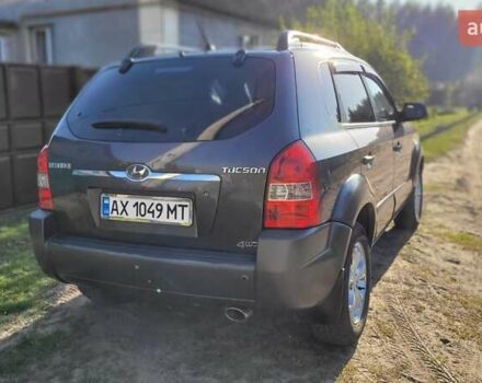 Серый Хендай Туксон, объемом двигателя 1.98 л и пробегом 190 тыс. км за 8500 $, фото 5 на Automoto.ua