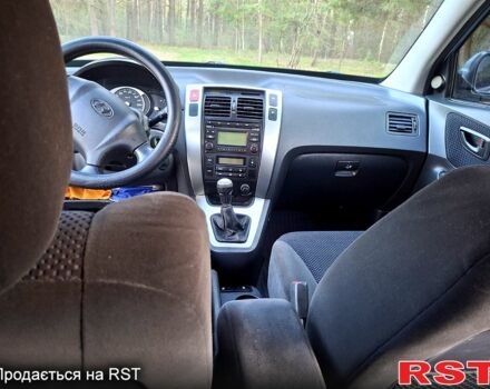 Серый Хендай Туксон, объемом двигателя 2 л и пробегом 220 тыс. км за 8800 $, фото 11 на Automoto.ua