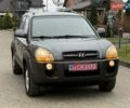 Сірий Хендай Туксон, об'ємом двигуна 2 л та пробігом 187 тис. км за 7700 $, фото 4 на Automoto.ua