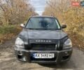 Серый Хендай Туксон, объемом двигателя 1.98 л и пробегом 220 тыс. км за 8500 $, фото 1 на Automoto.ua
