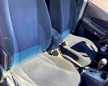 Сірий Хендай Туксон, об'ємом двигуна 2 л та пробігом 225 тис. км за 7800 $, фото 5 на Automoto.ua