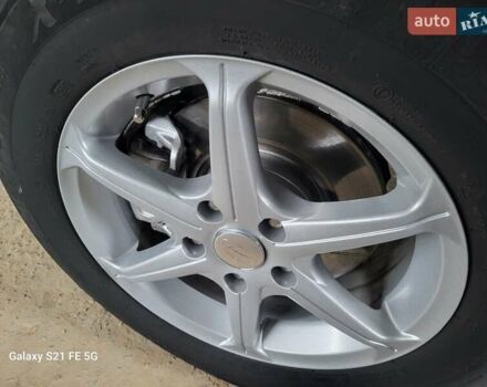 Серый Хендай Туксон, объемом двигателя 1.99 л и пробегом 302 тыс. км за 9300 $, фото 24 на Automoto.ua