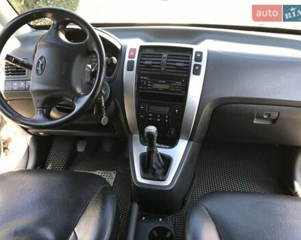 Сірий Хендай Туксон, об'ємом двигуна 1.98 л та пробігом 191 тис. км за 8200 $, фото 7 на Automoto.ua