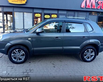 Сірий Хендай Туксон, об'ємом двигуна 2 л та пробігом 216 тис. км за 8200 $, фото 11 на Automoto.ua