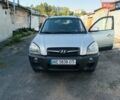 Сірий Хендай Туксон, об'ємом двигуна 1.99 л та пробігом 210 тис. км за 7600 $, фото 1 на Automoto.ua