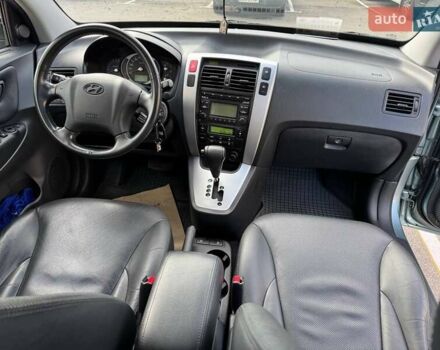 Серый Хендай Туксон, объемом двигателя 2 л и пробегом 48 тыс. км за 11800 $, фото 19 на Automoto.ua