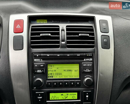 Сірий Хендай Туксон, об'ємом двигуна 2 л та пробігом 213 тис. км за 8500 $, фото 36 на Automoto.ua