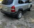 Сірий Хендай Туксон, об'ємом двигуна 2 л та пробігом 370 тис. км за 7500 $, фото 8 на Automoto.ua