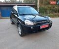 Серый Хендай Туксон, объемом двигателя 1.98 л и пробегом 206 тыс. км за 8600 $, фото 1 на Automoto.ua