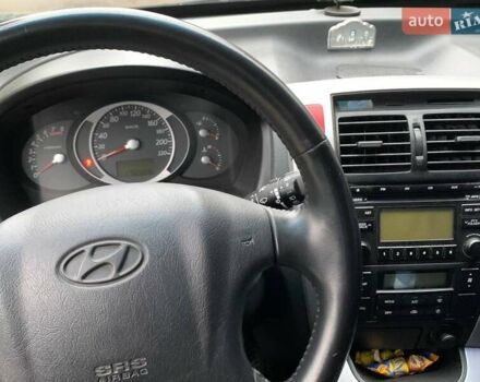 Сірий Хендай Туксон, об'ємом двигуна 1.98 л та пробігом 170 тис. км за 8800 $, фото 21 на Automoto.ua