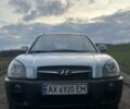 Серый Хендай Туксон, объемом двигателя 1.98 л и пробегом 197 тыс. км за 9800 $, фото 1 на Automoto.ua