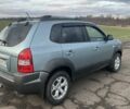 Серый Хендай Туксон, объемом двигателя 1.98 л и пробегом 197 тыс. км за 9800 $, фото 2 на Automoto.ua