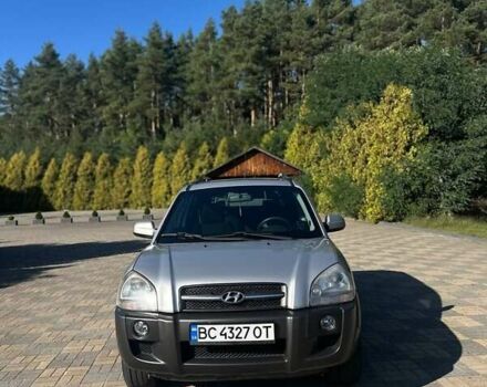 Серый Хендай Туксон, объемом двигателя 1.99 л и пробегом 255 тыс. км за 5800 $, фото 6 на Automoto.ua