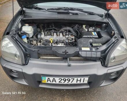 Серый Хендай Туксон, объемом двигателя 1.99 л и пробегом 302 тыс. км за 9300 $, фото 23 на Automoto.ua