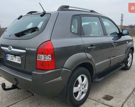 Серый Хендай Туксон, объемом двигателя 1.98 л и пробегом 177 тыс. км за 8200 $, фото 17 на Automoto.ua