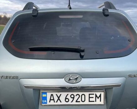 Серый Хендай Туксон, объемом двигателя 1.98 л и пробегом 197 тыс. км за 9800 $, фото 4 на Automoto.ua