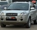 Серый Хендай Туксон, объемом двигателя 1.98 л и пробегом 140 тыс. км за 9300 $, фото 2 на Automoto.ua