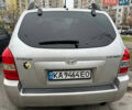Серый Хендай Туксон, объемом двигателя 1.98 л и пробегом 227 тыс. км за 7700 $, фото 2 на Automoto.ua