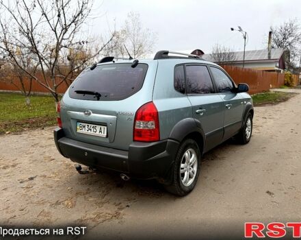 Серый Хендай Туксон, объемом двигателя 2.7 л и пробегом 228 тыс. км за 7650 $, фото 4 на Automoto.ua